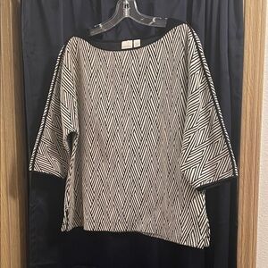 Chico’s women’s boar neck top. Size 2, black and cream diamond jacquard design.